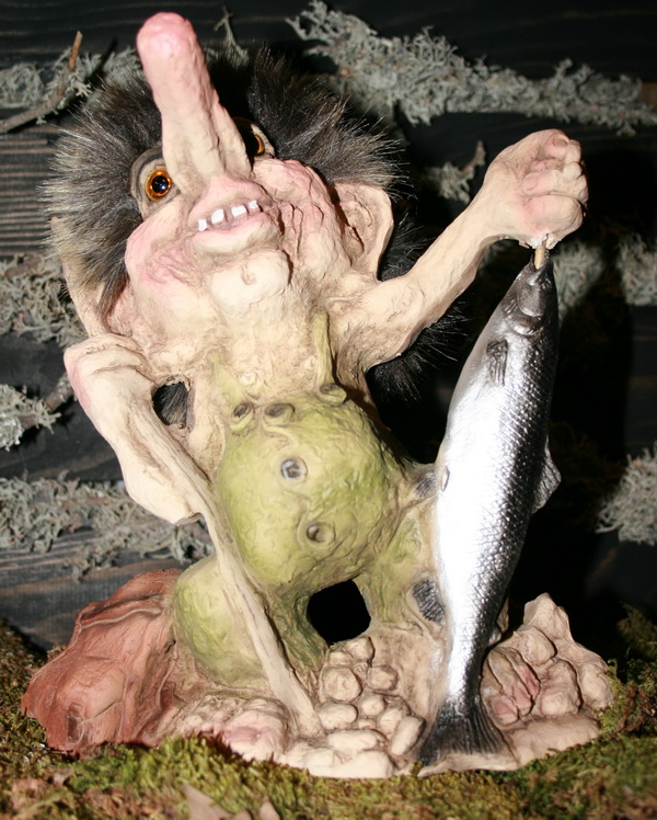 "Buona pesca" Pescatore troll con pesce